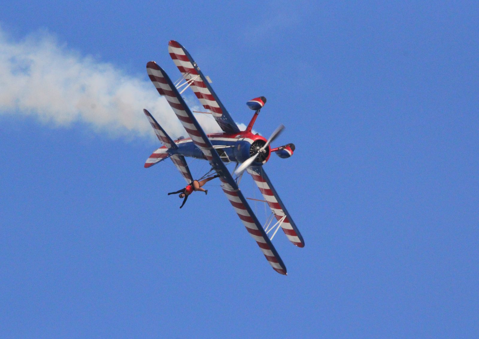 Aerobatic aircraft in blue sky
